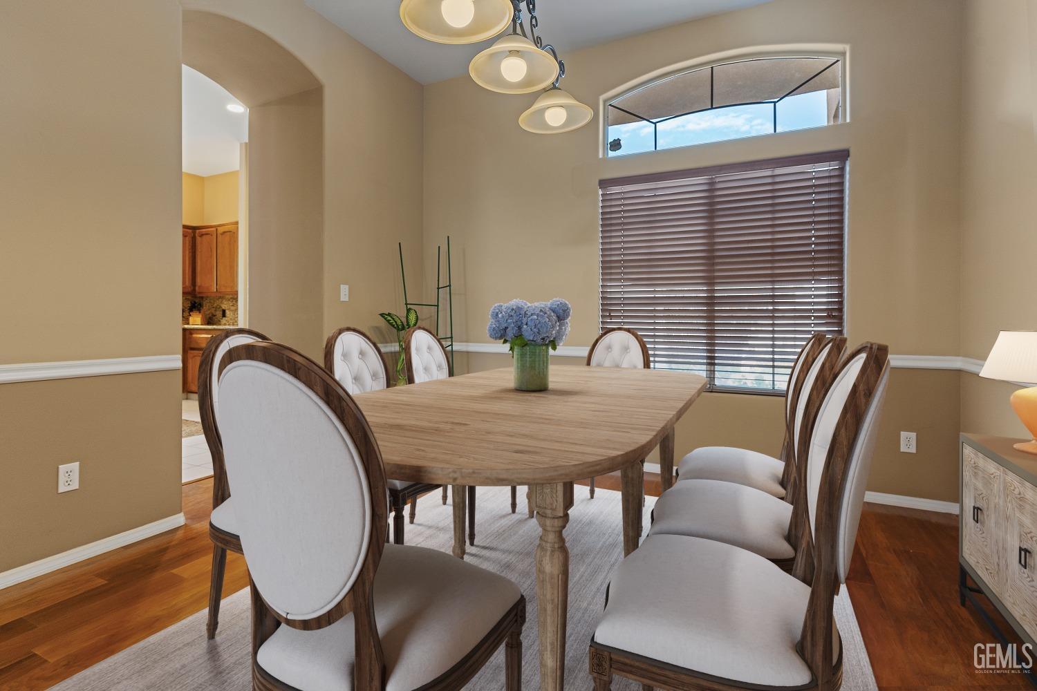 Undisclosed Address Bakersfield, CA 93306 - Photo 13 of 41 a view of a dining room with furniture window and wooden floor