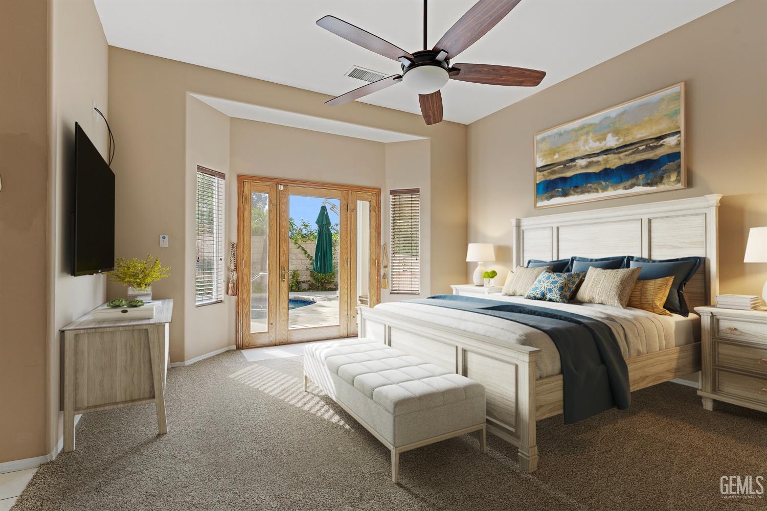 Undisclosed Address Bakersfield, CA 93306 - Photo 16 of 41 a bedroom with a bed and a flat screen tv