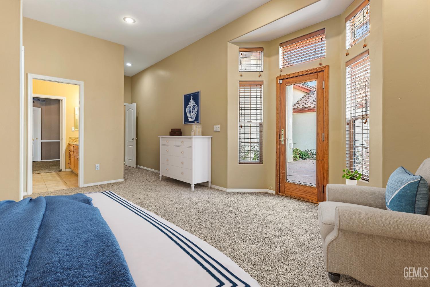Undisclosed Address Bakersfield, CA 93306 - Photo 26 of 41 a living room with furniture and a large window
