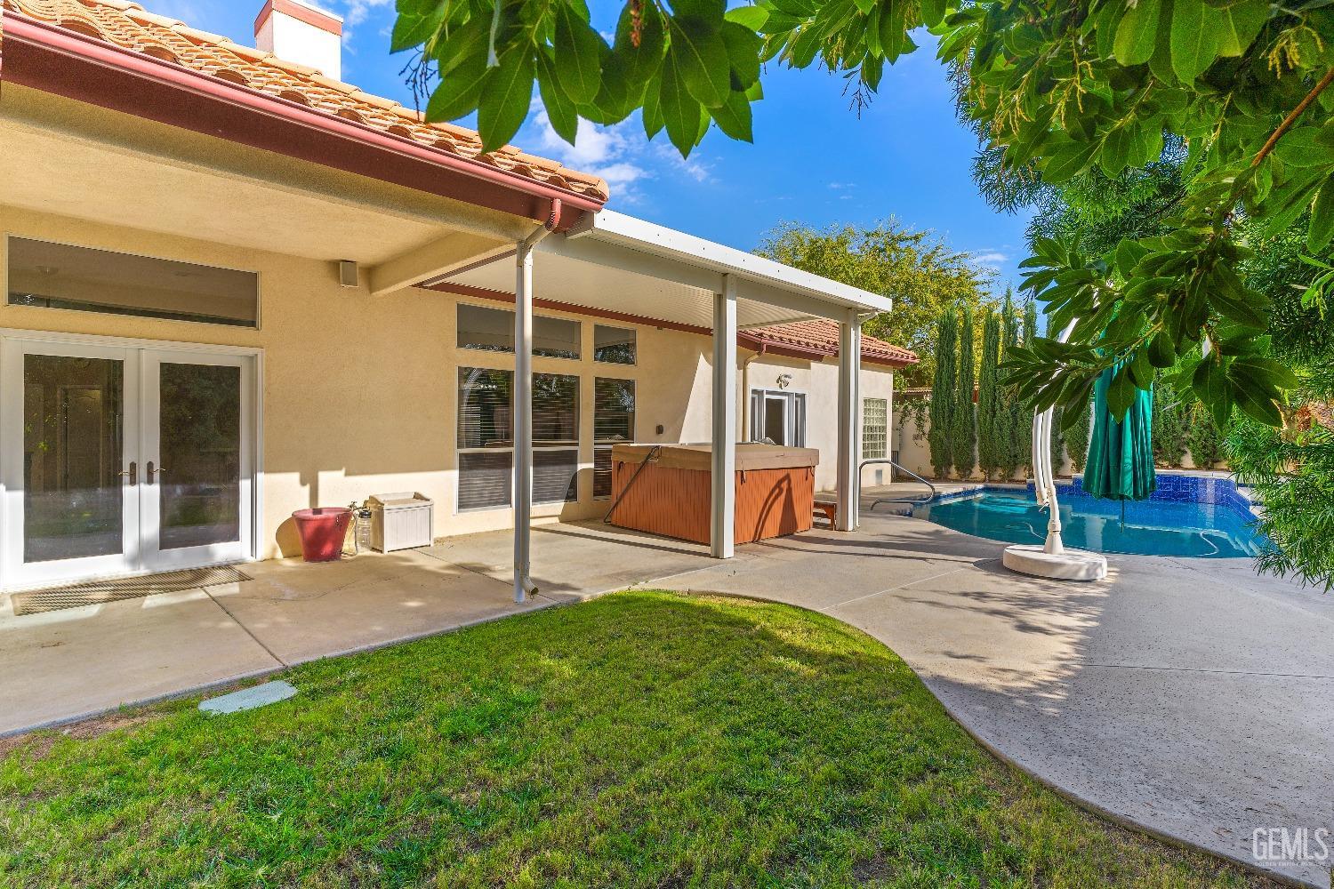 Undisclosed Address Bakersfield, CA 93306 - Photo 29 of 41 front view of a house with a patio