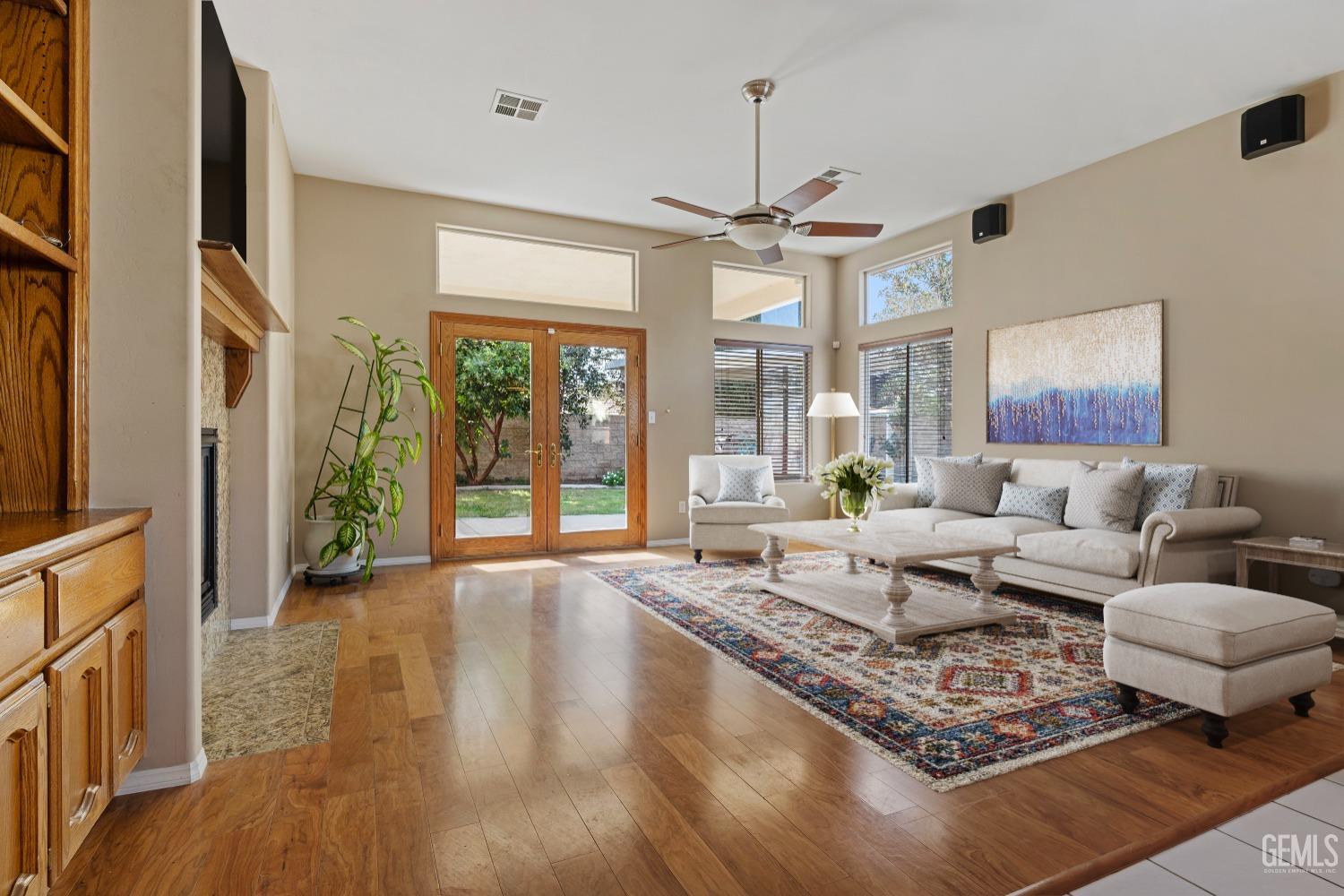 Undisclosed Address Bakersfield, CA 93306 - Photo 5 of 41 a living room with furniture and a chandelier