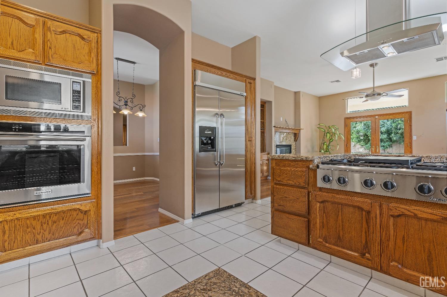 Undisclosed Address Bakersfield, CA 93306 - Photo 9 of 41 a kitchen with cabinets and window