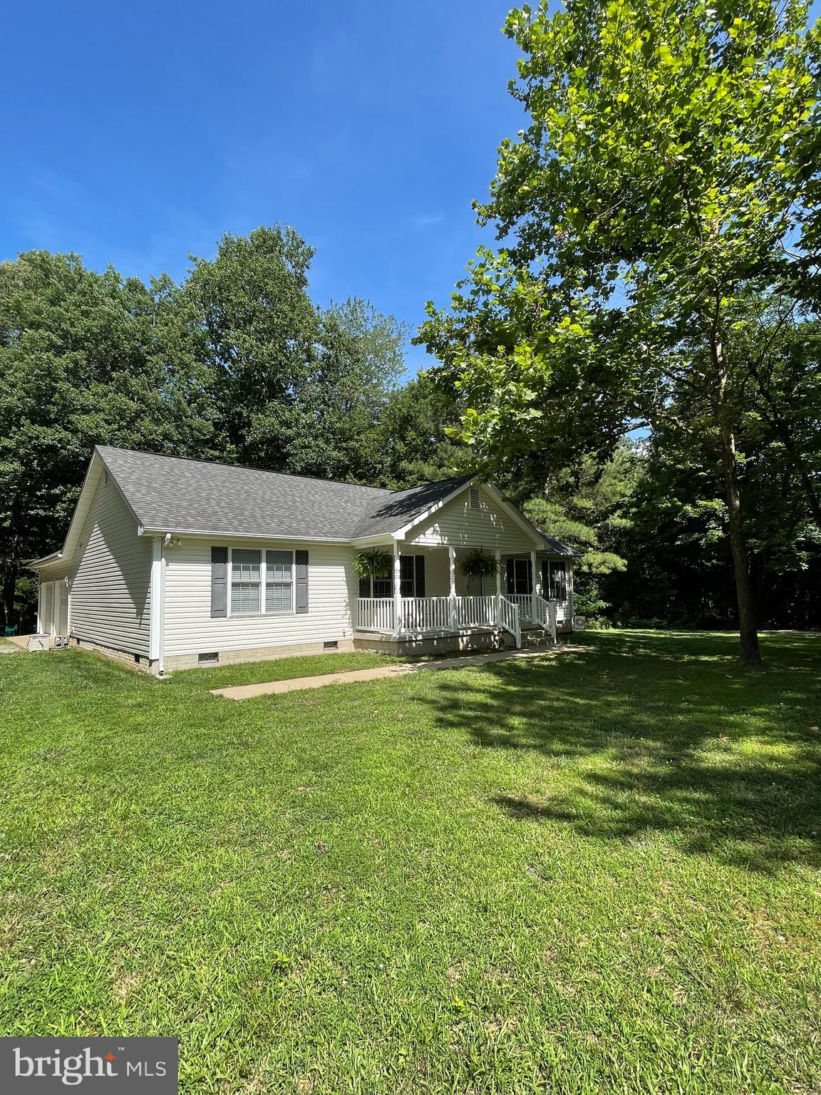 7407 Rixey Road King George, VA 22485 - Photo 1 of 29 Watch wildlife from the big porch with ceiling fan