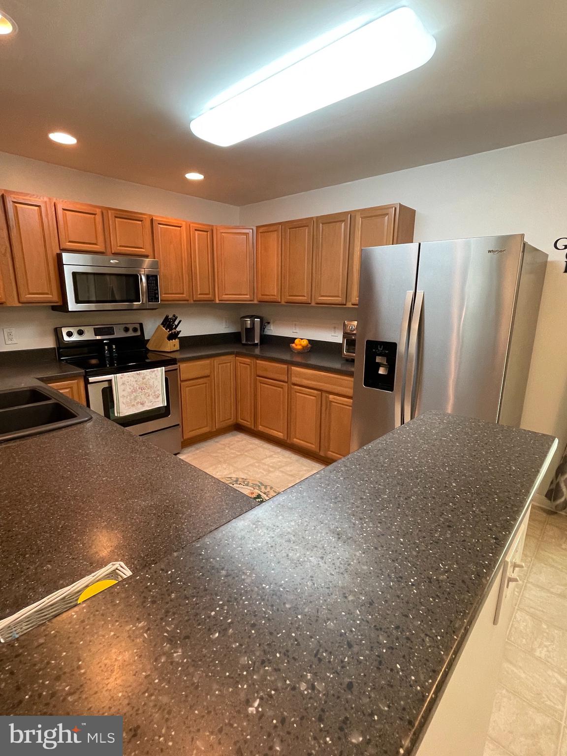 7407 Rixey Road King George, VA 22485 - Photo 16 of 29 Plenty of cabinets and solid surface countertops!