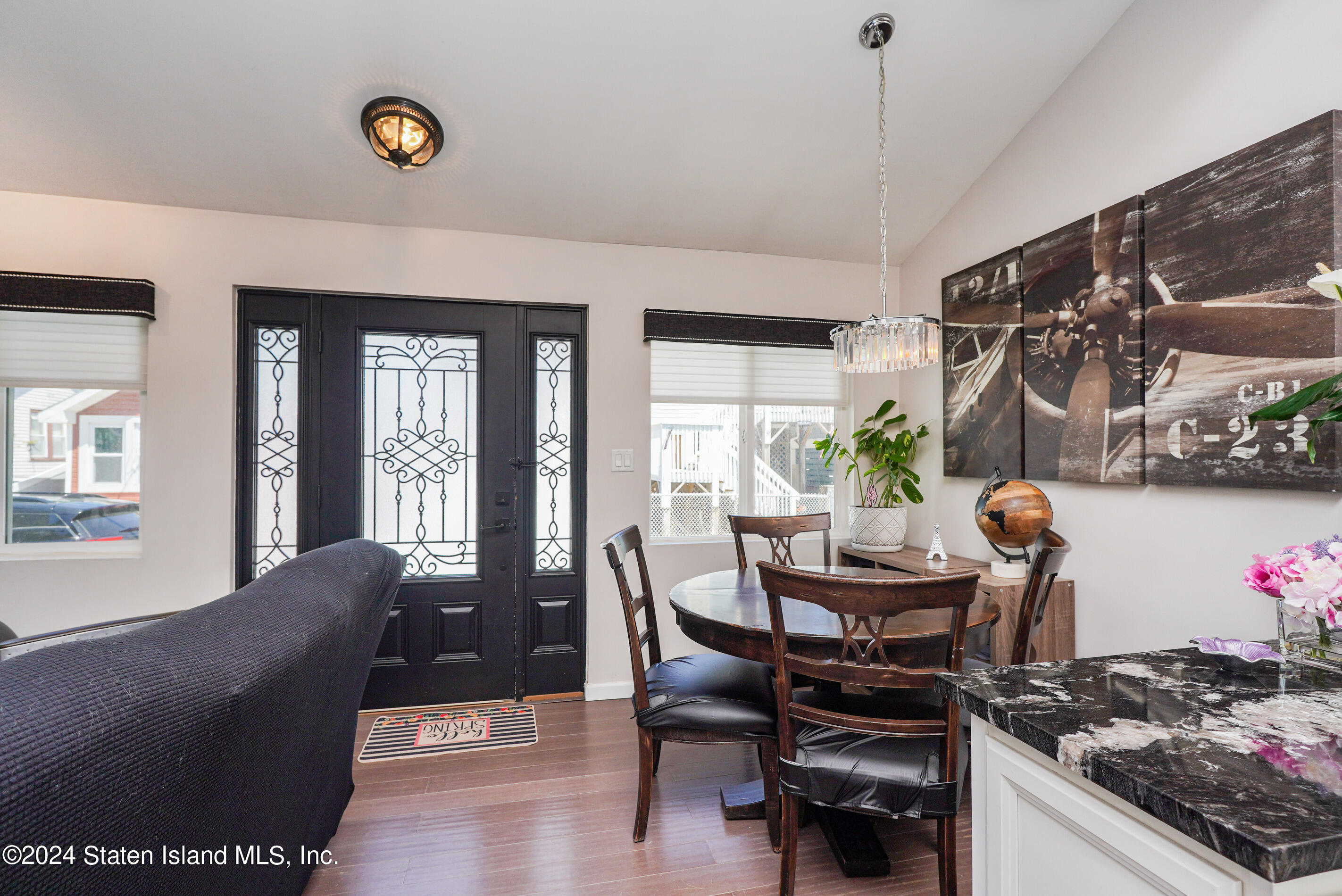 38 Milbank Road Staten Island, NY 10306 - Photo 11 of 30 a view of a livingroom with furniture and a window