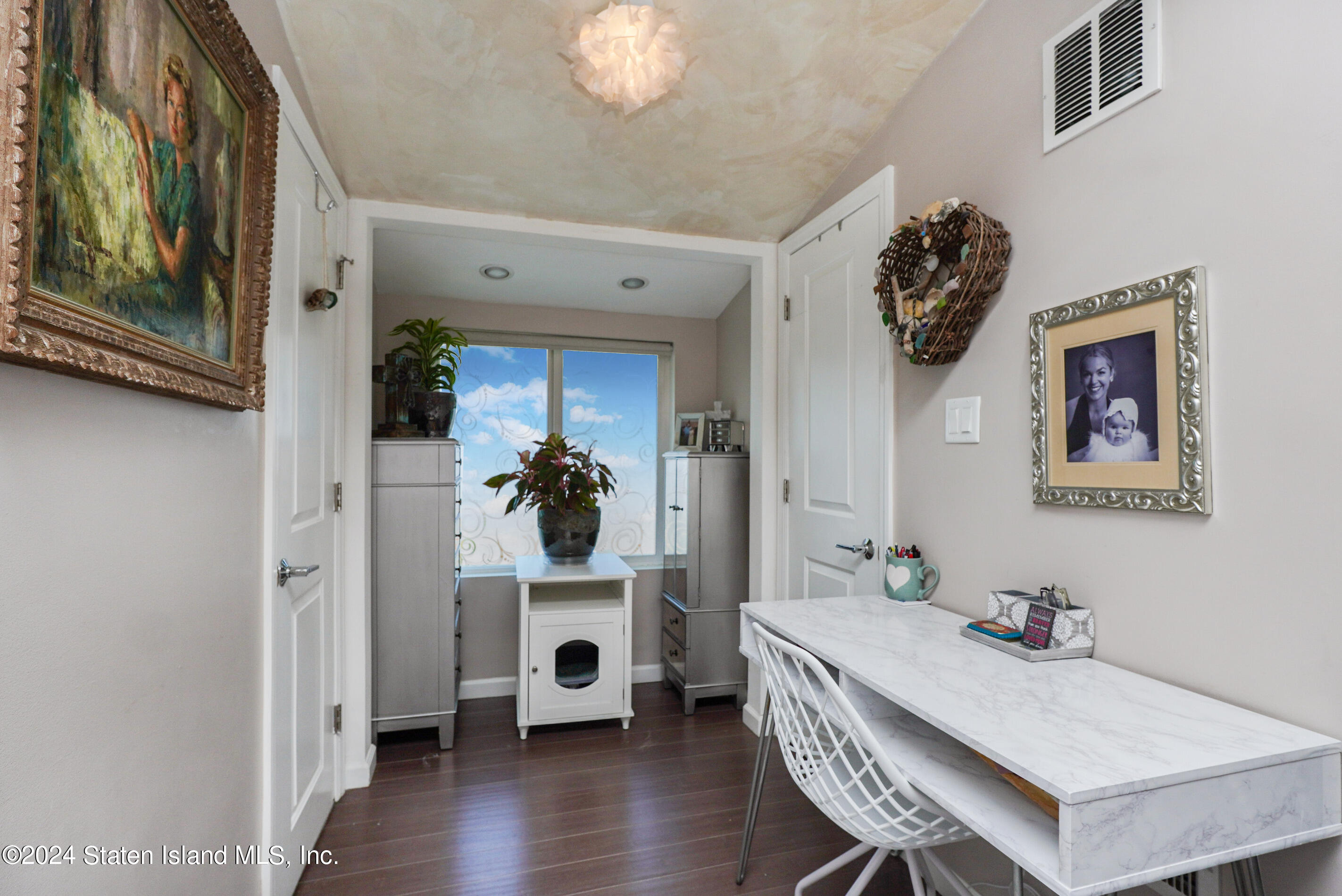 38 Milbank Road Staten Island, NY 10306 - Photo 20 of 30 a view of a dining room with furniture and wooden floor