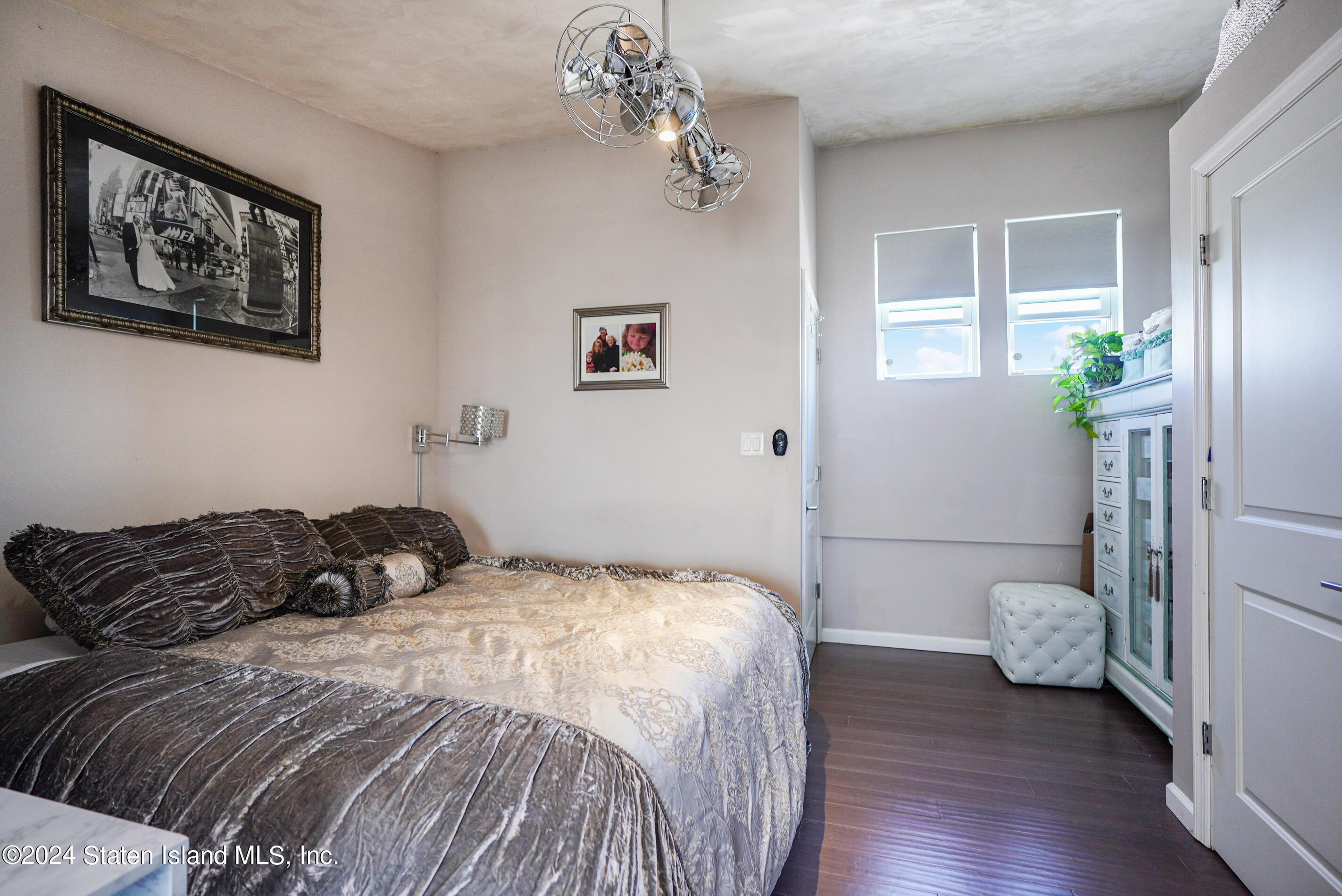 38 Milbank Road Staten Island, NY 10306 - Photo 22 of 30 a bedroom with a bed and a window
