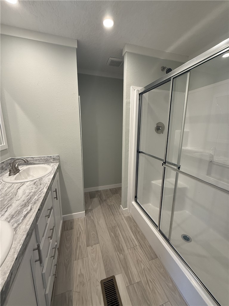 108 Candlestick Lane Seneca, SC 29678 - Photo 5 of 14 The vanity complementsa contemporary walk-in shower in this well-appointed bath.