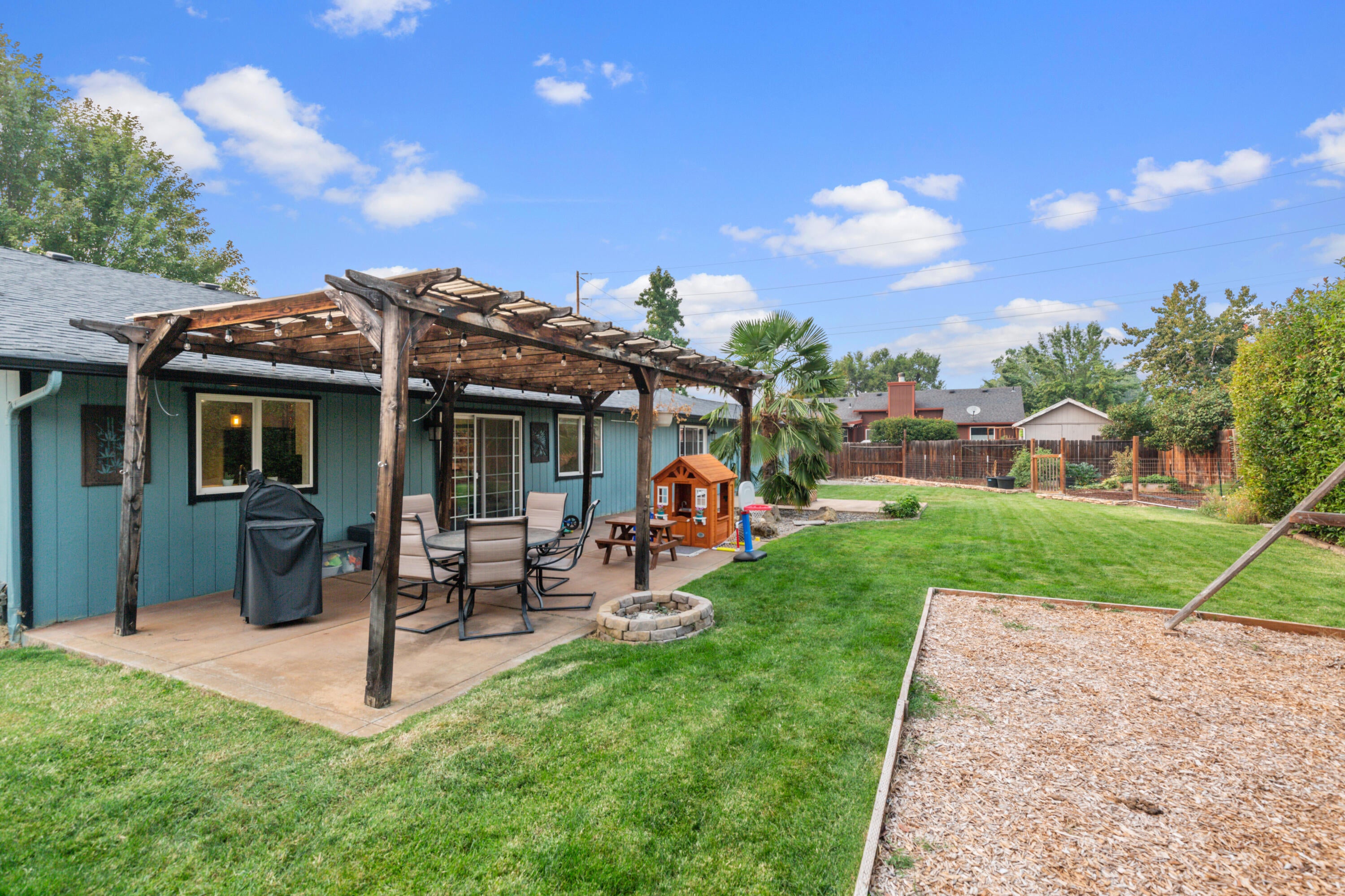 3044 Delta Waters Road Medford, OR 97504 - Photo 25 of 30 Pergola and separate vegetable garden