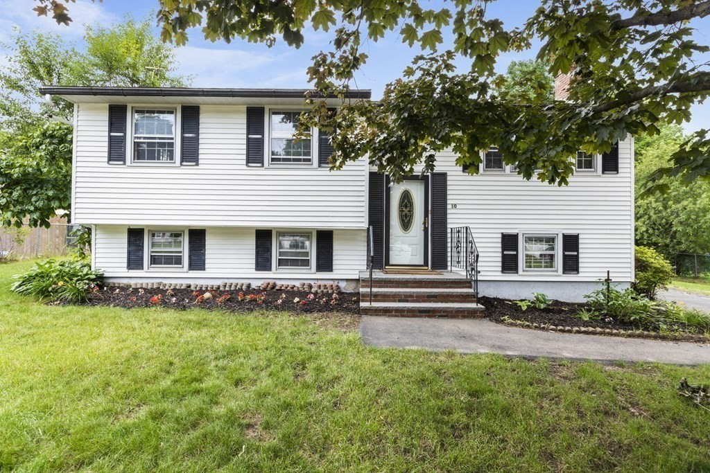 10 Fitzpatrick Avenue Brockton, MA 02301 - Photo 1 of 34 a front view of a house with a garden