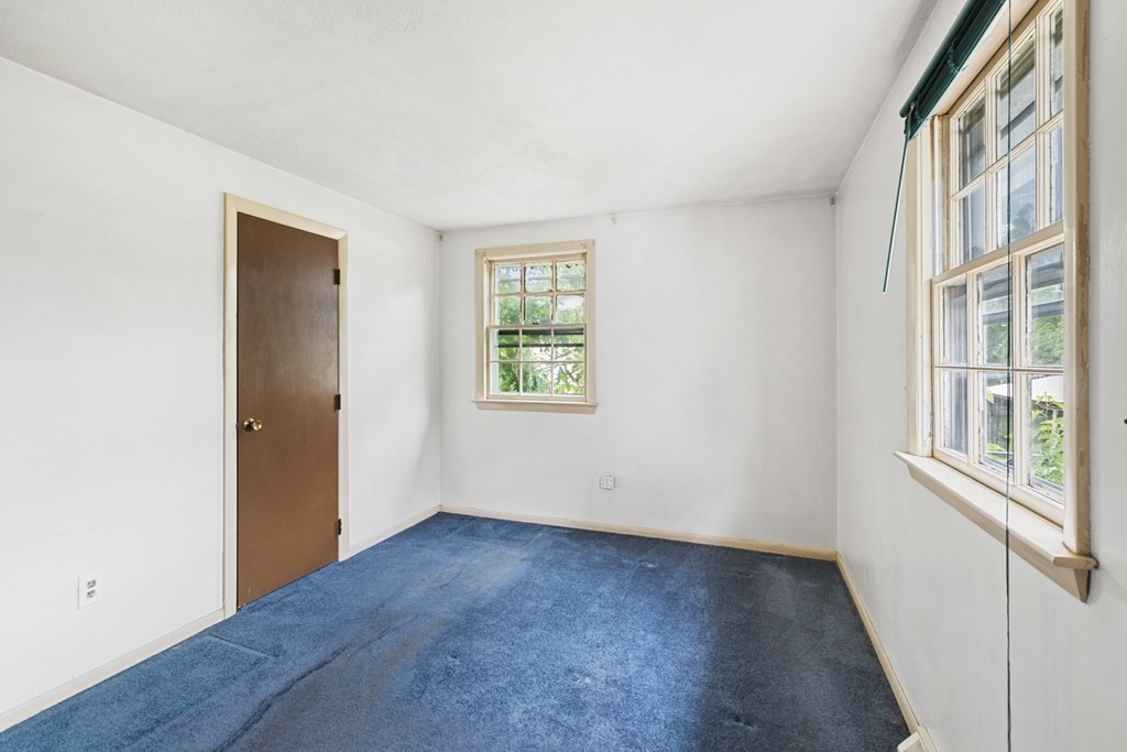 10 Fitzpatrick Avenue Brockton, MA 02301 - Photo 15 of 34 an empty room with wooden floor and windows