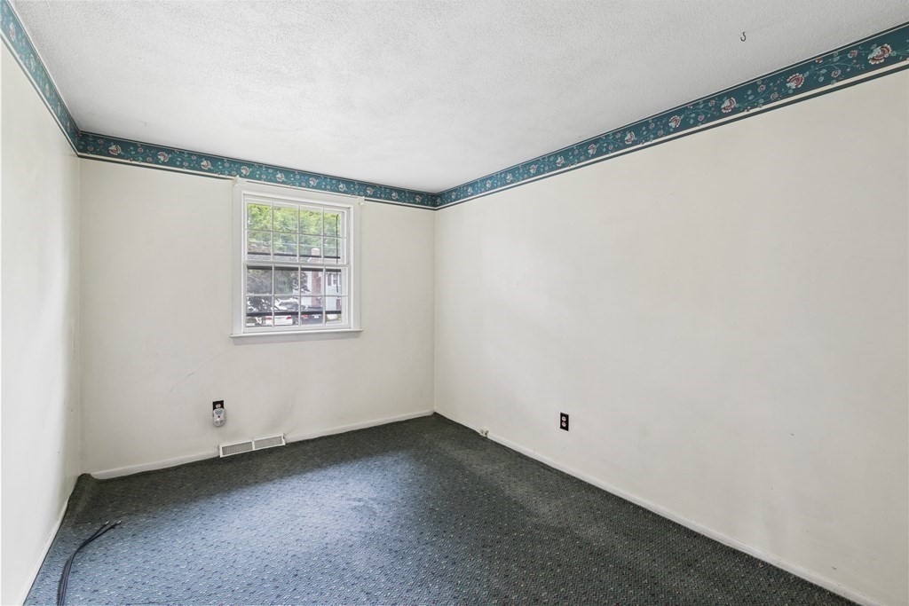 10 Fitzpatrick Avenue Brockton, MA 02301 - Photo 17 of 34 a view of a room that has a large window