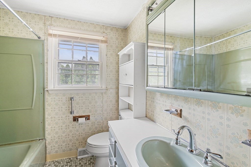 10 Fitzpatrick Avenue Brockton, MA 02301 - Photo 21 of 34 a bathroom with a granite countertop sink toilet and shower