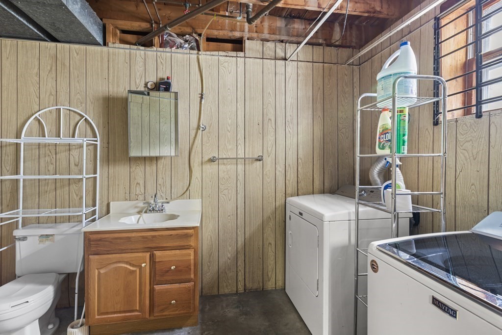 10 Fitzpatrick Avenue Brockton, MA 02301 - Photo 25 of 34 a bathroom with a sink a toilet and shower