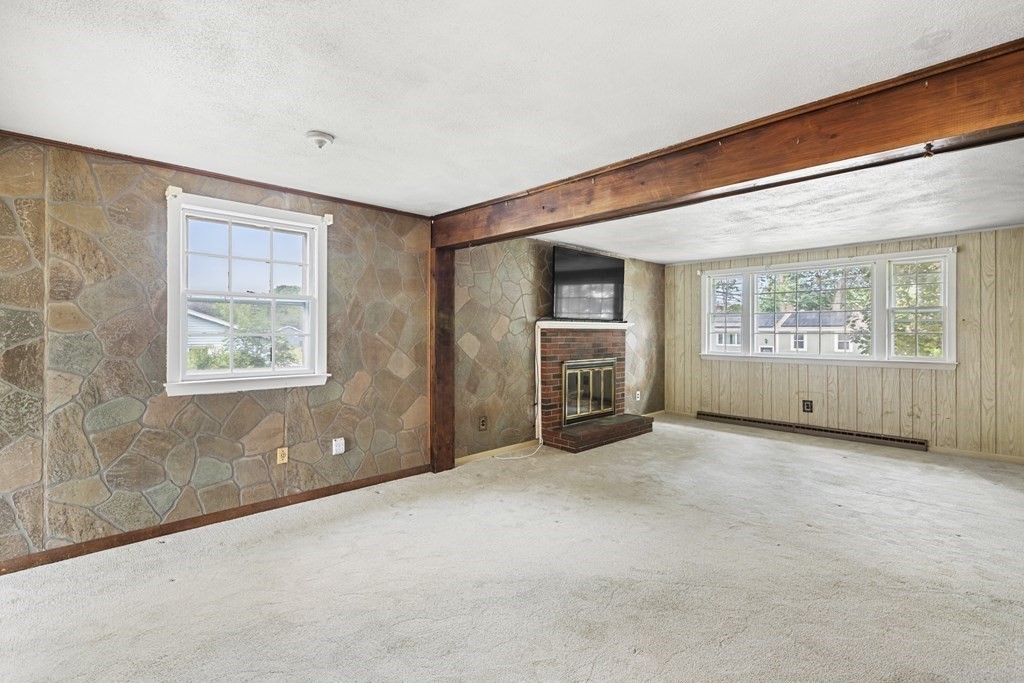 10 Fitzpatrick Avenue Brockton, MA 02301 - Photo 9 of 34 an empty room with windows and closet