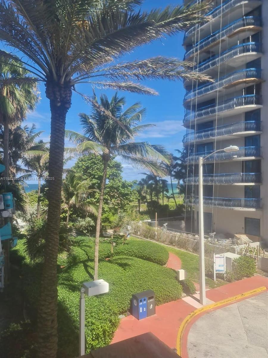 8911 Collins Avenue, Unit 203 Surfside, FL 33154 - Photo 9 of 10 a view of a garden from a balcony