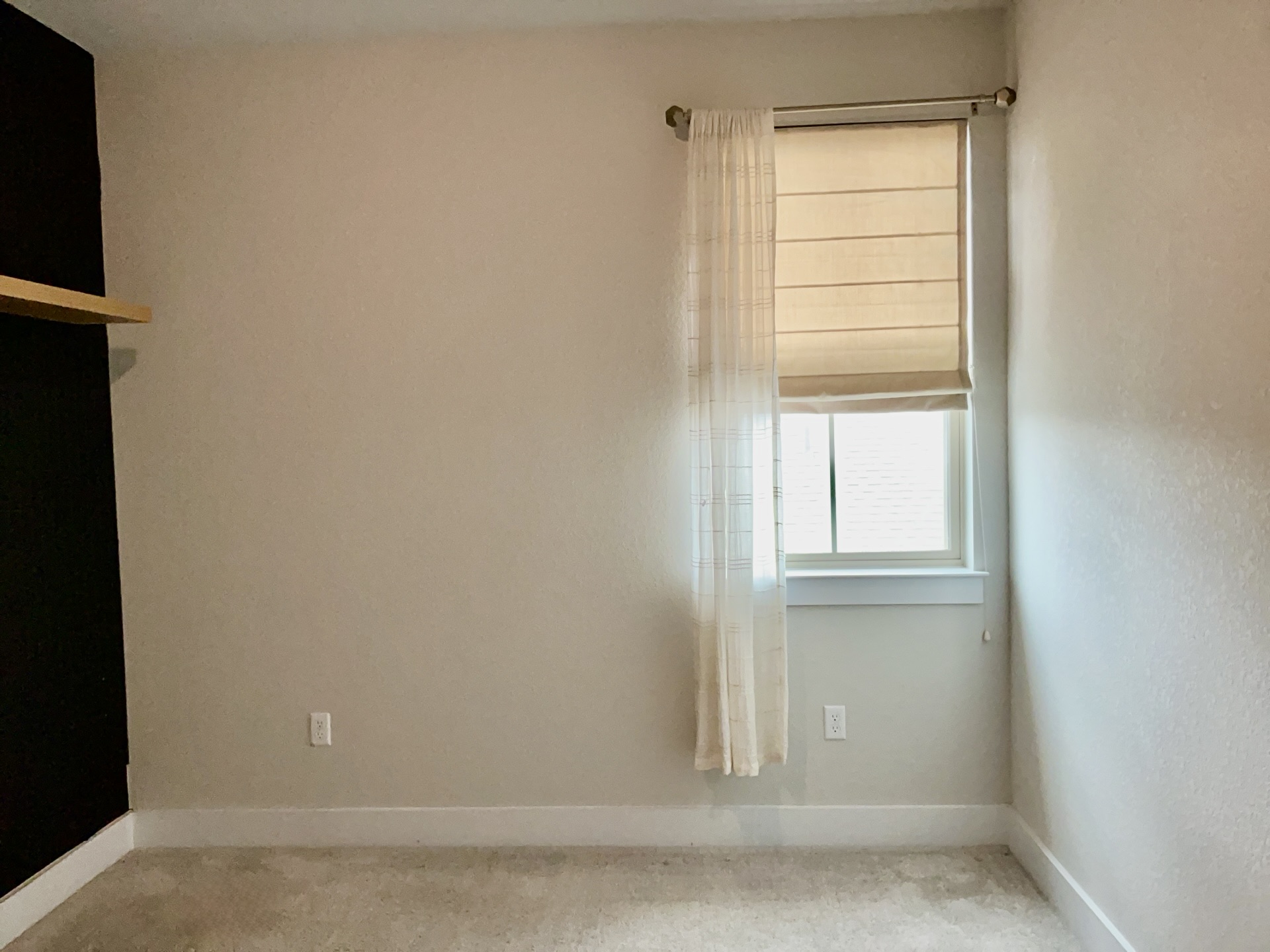 8315 Laughlin Lane Austin, TX 78744 - Photo 17 of 23 Bedroom with baseboards and carpet flooring