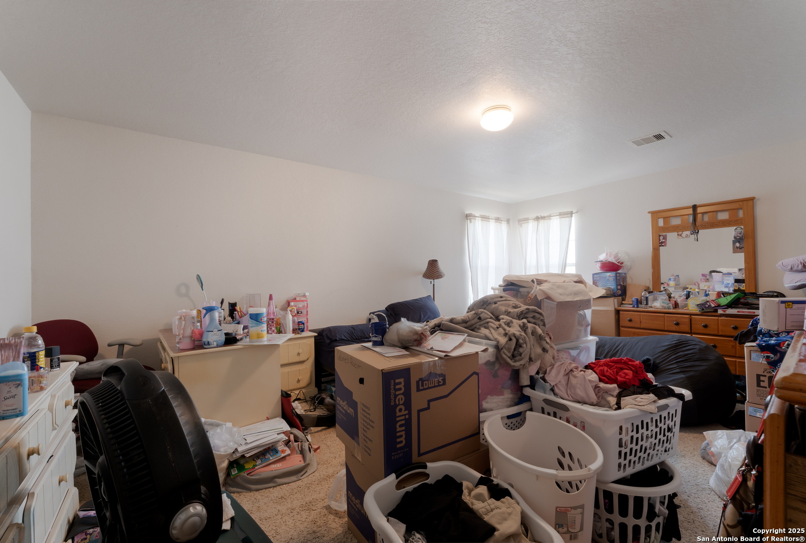 144 Springtree Bluff Cibolo, TX 78108 - Photo 28 of 37 a view of a workspace with furniture and a bedroom