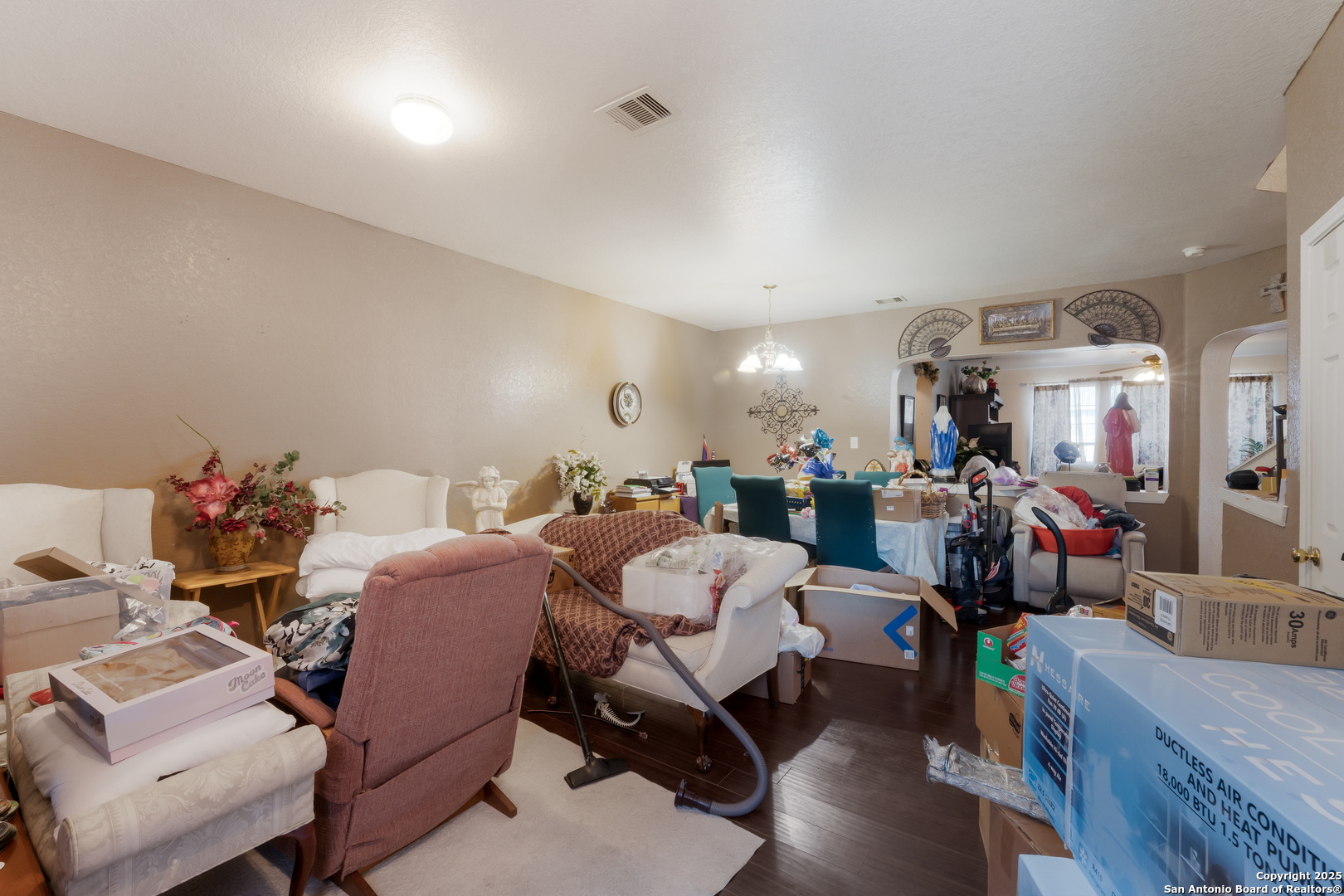 144 Springtree Bluff Cibolo, TX 78108 - Photo 5 of 37 a room with furniture a rug and a gym equipment