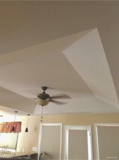 2435 Gibson Road Grand Blanc, MI 48439 - Photo 9 of 25 tray ceiling in living room