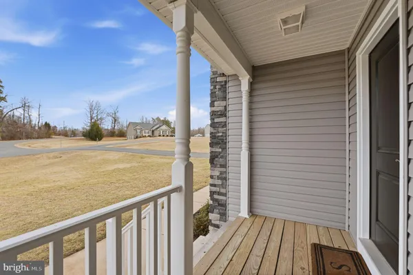 a view of a balcony with an outdoor space