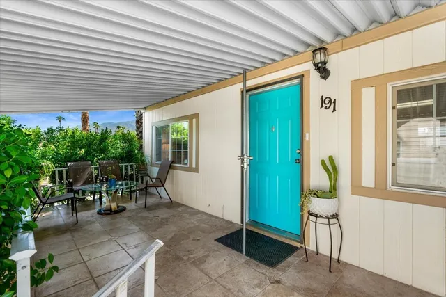 a view of outdoor dining space with a patio