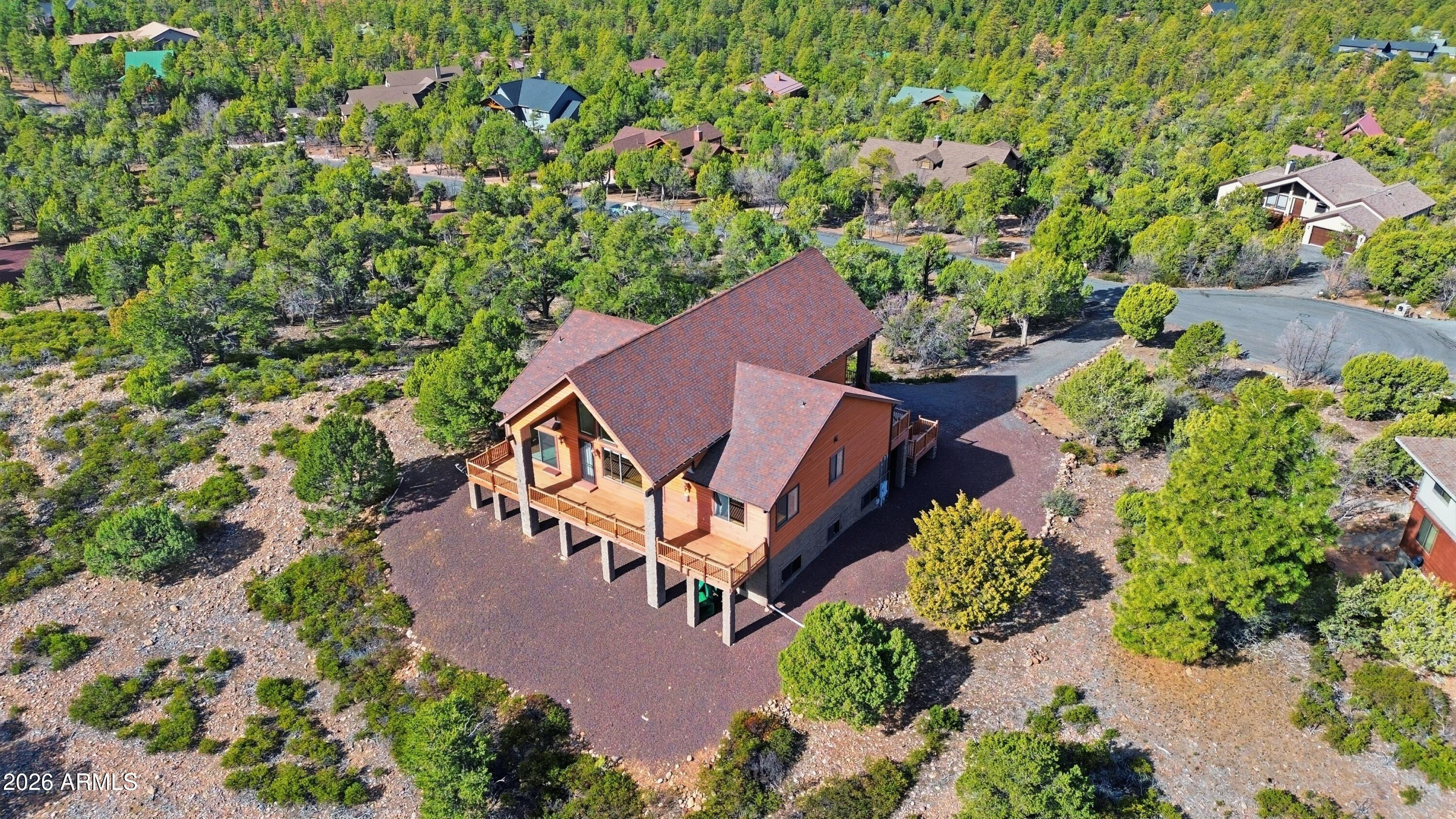 1561 South Canyon Ridge Trail Show Low, AZ 85901 - Photo 55 of 61 an aerial view of a house with a yard