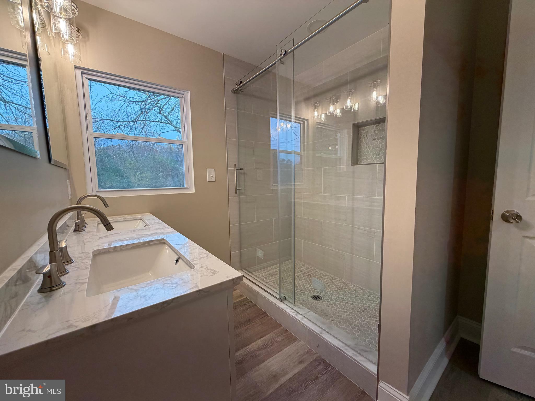41010 New Market Turner Road Mechanicsville, MD 20659 - Photo 2 of 14 Tiled shower with glass doors in owner’s bath