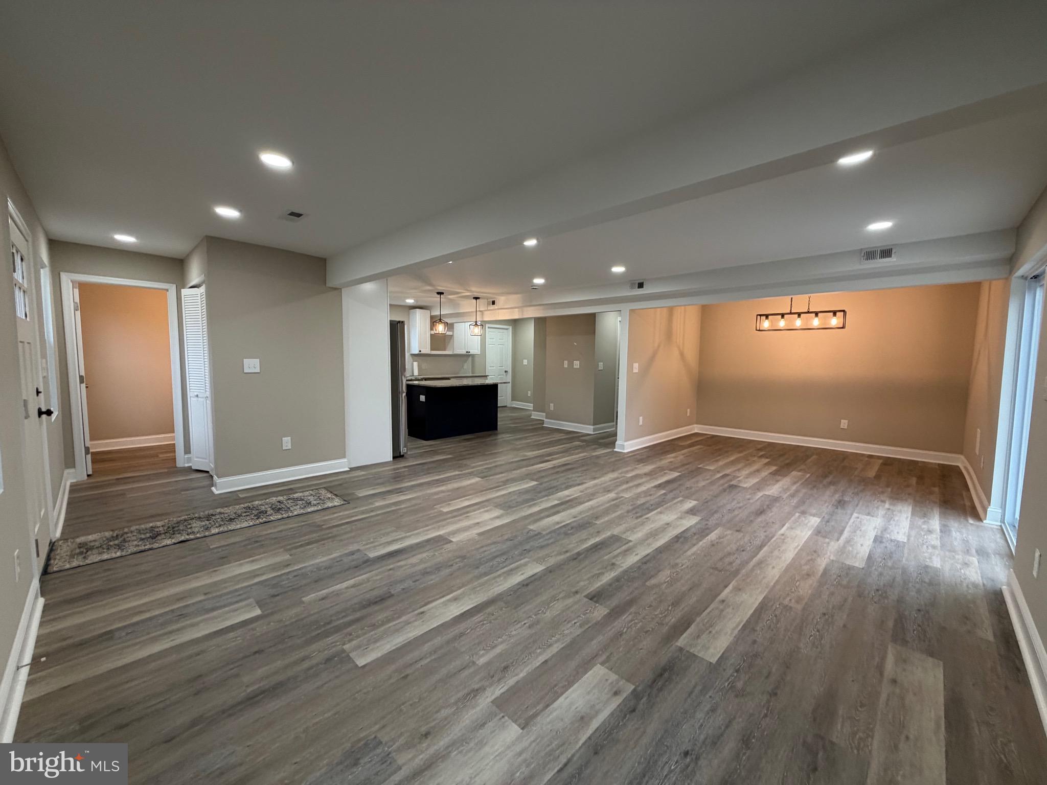41010 New Market Turner Road Mechanicsville, MD 20659 - Photo 3 of 14 Open dining and living area for entertaining