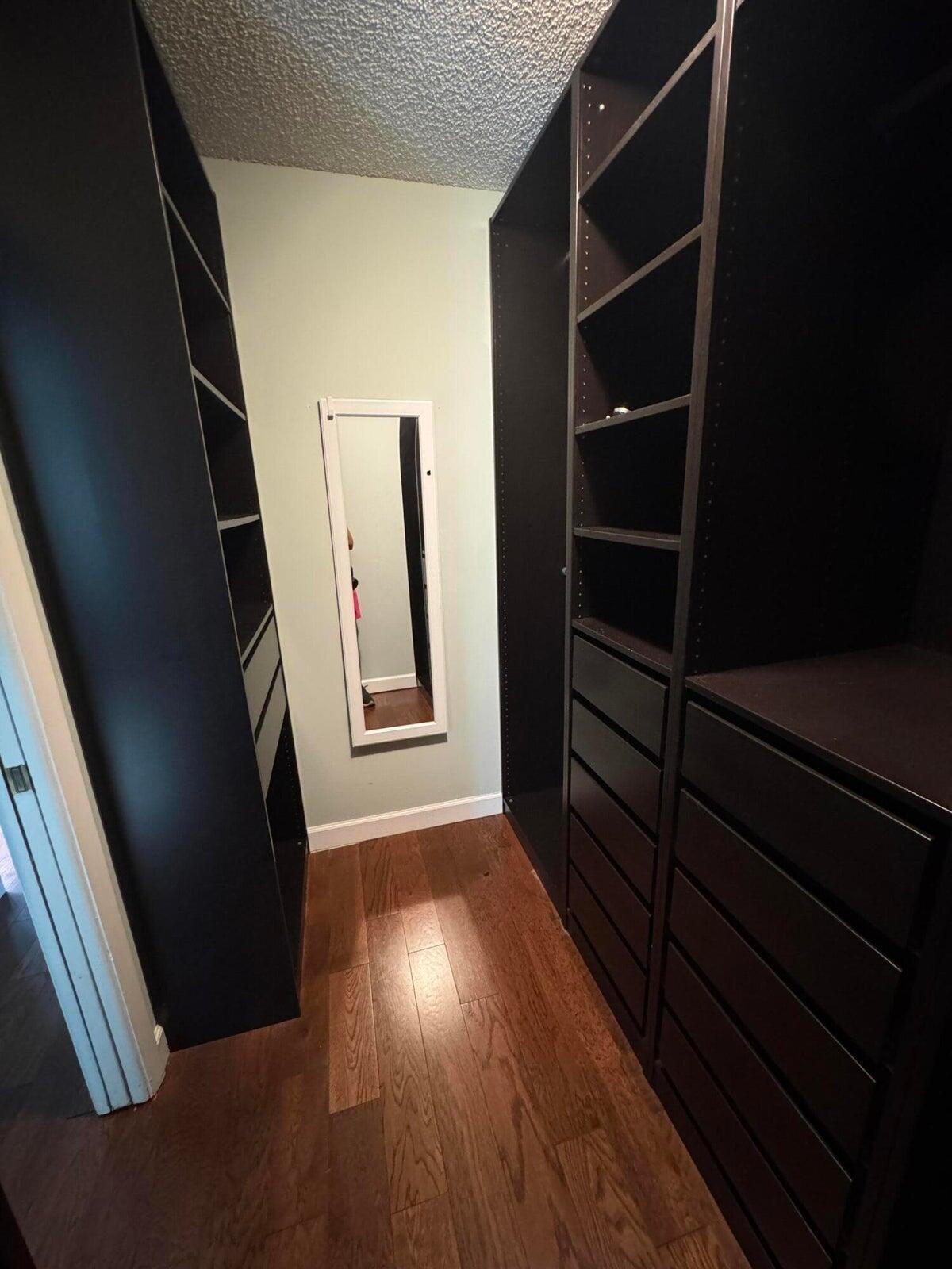 23261 Boca Club Colony Circle Boca Raton, FL 33433 - Photo 10 of 17 a view of an empty room with wooden floor and a window