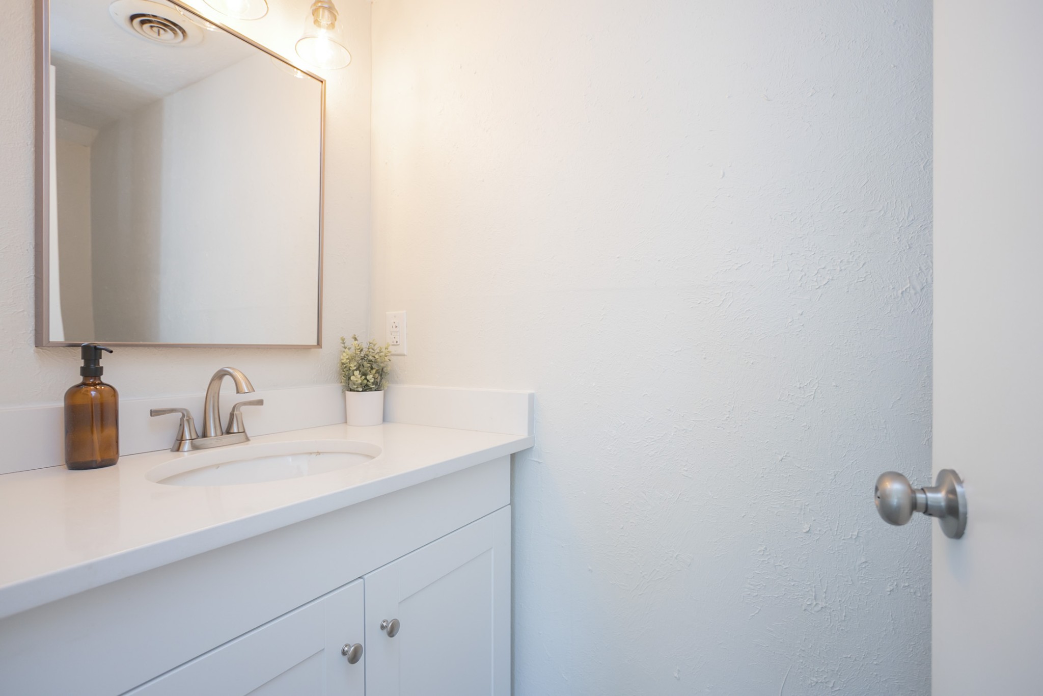 810 Bellevue Road, Unit 214 Nashville, TN 37221 - Photo 11 of 27 a bathroom with a sink and a mirror