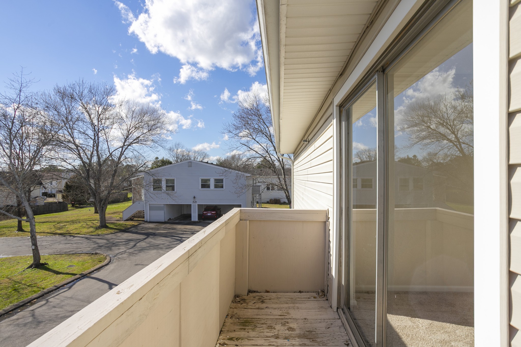 810 Bellevue Road, Unit 214 Nashville, TN 37221 - Photo 21 of 27 a view of a house with a yard