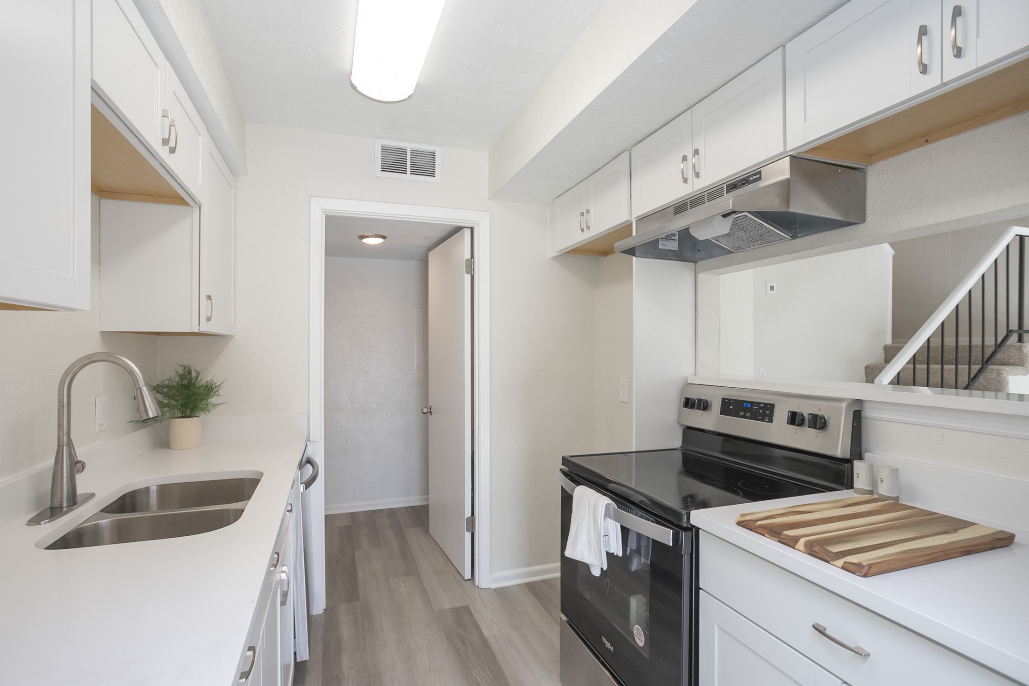 810 Bellevue Road, Unit 214 Nashville, TN 37221 - Photo 8 of 27 a kitchen with cabinets and steel appliances