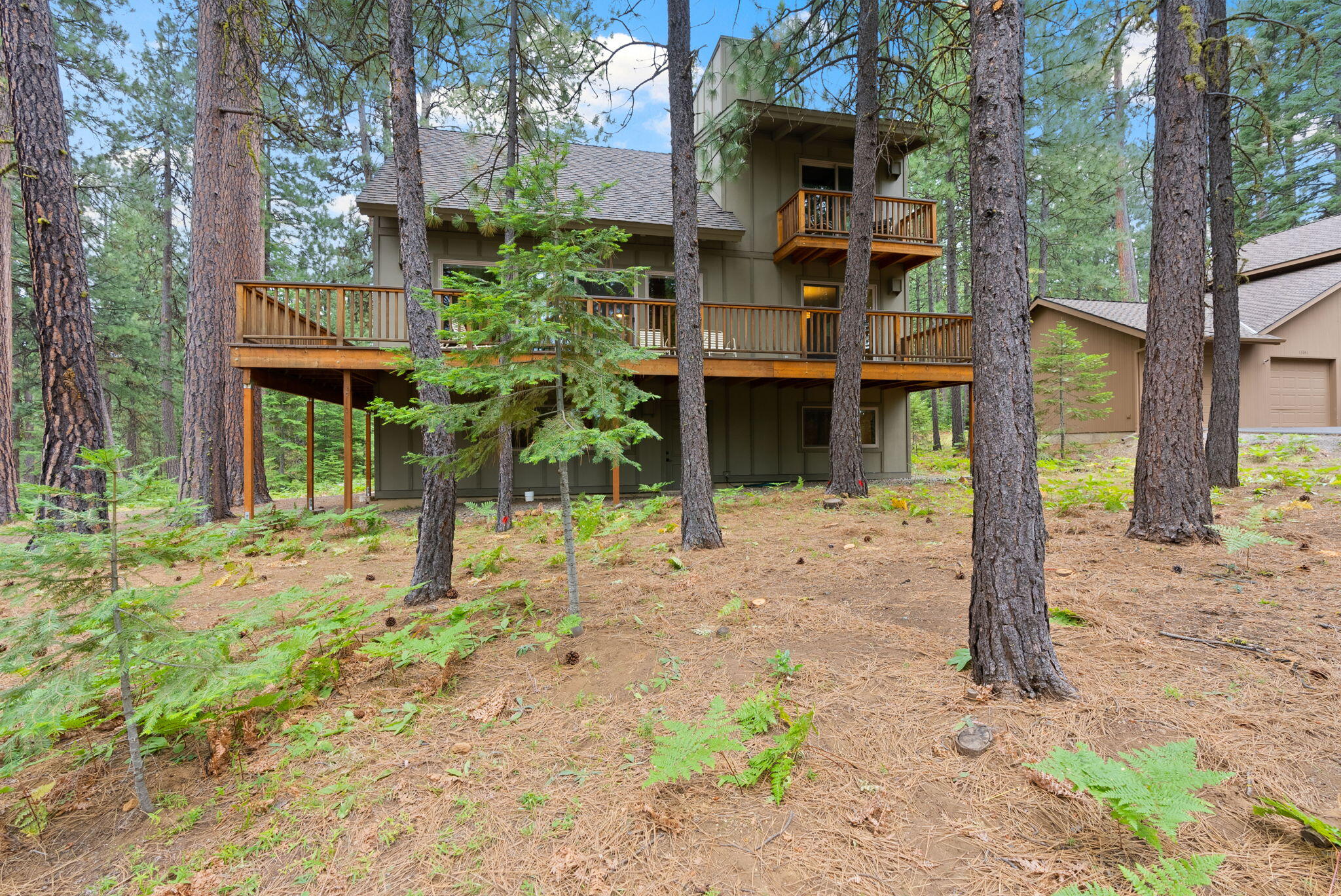 13251 Snowbrush, Unit GH 266 Black Butte Ranch, OR 97759 - Photo 26 of 37 a view of a house with small yard