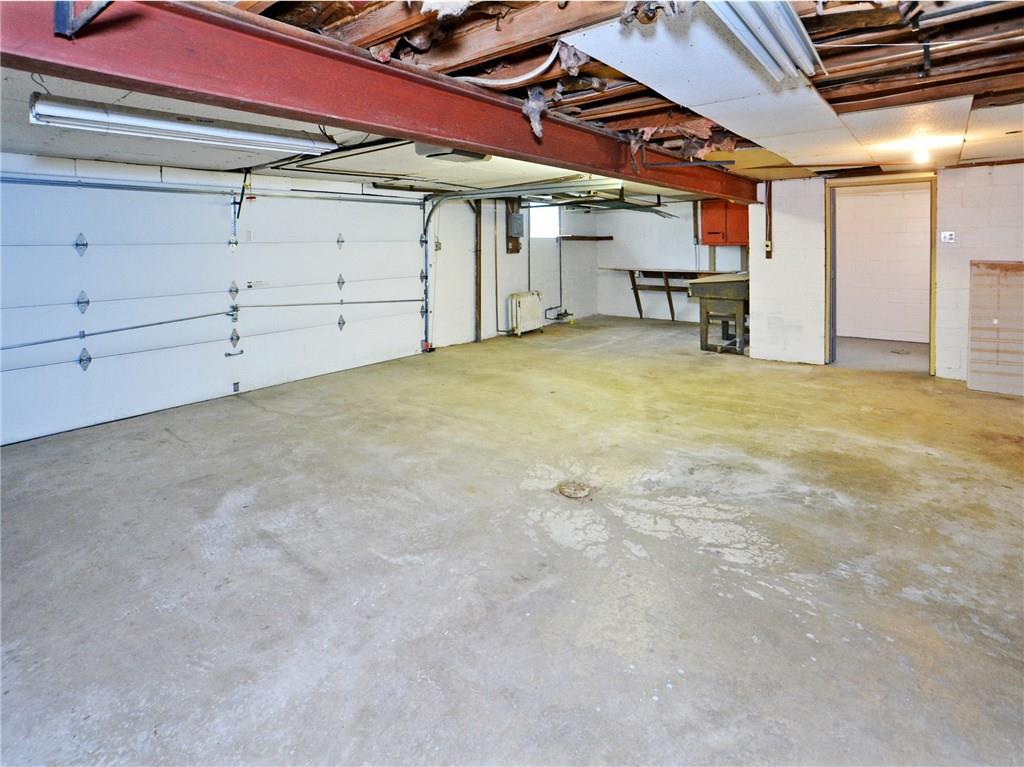 14111 Ridge Road North Huntingdon, PA 15642 - Photo 14 of 24 Huge garage -- this is the 2 car garage - very oversized; workshop area; bathroom, auto door opener on double door.