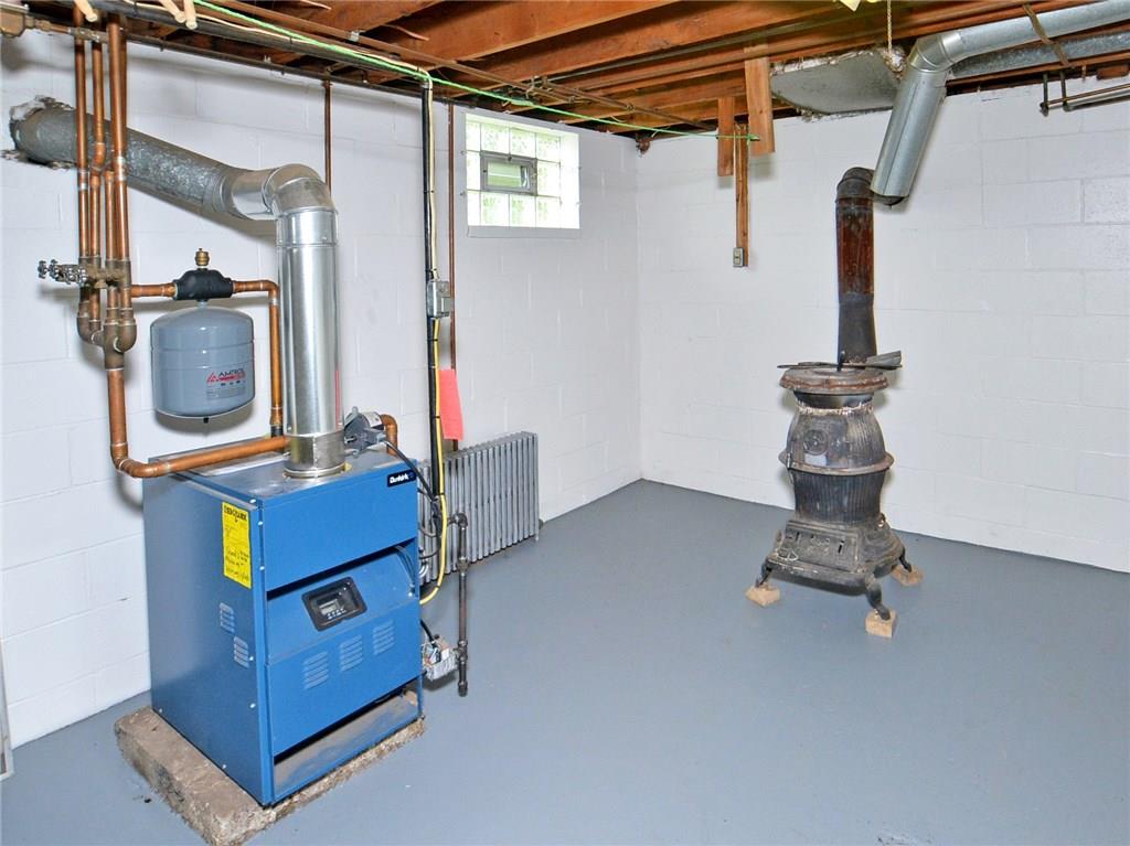 14111 Ridge Road North Huntingdon, PA 15642 - Photo 17 of 24 Hot Water Boiler - about 2-3 years old - BEST HEAT AROUND - CENTRAL AIR IN THIS HOME ALSO. Wood burner (antique), included.