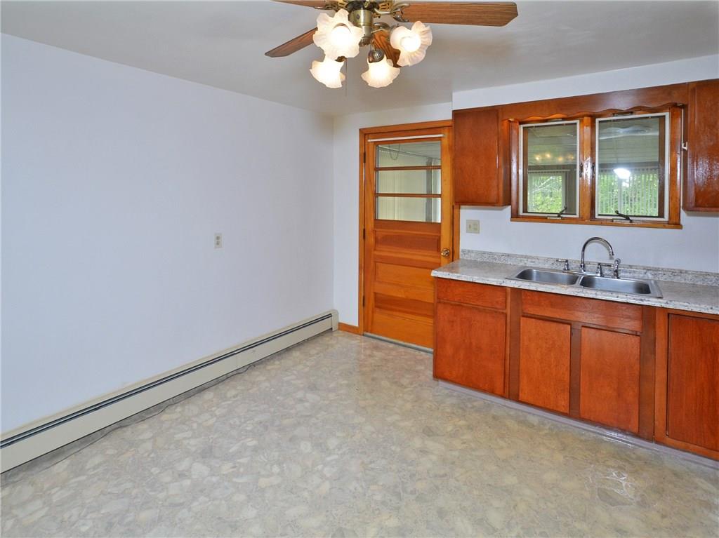 14111 Ridge Road North Huntingdon, PA 15642 - Photo 5 of 24 More of the kitchen with the door into the 4 seasons family room.