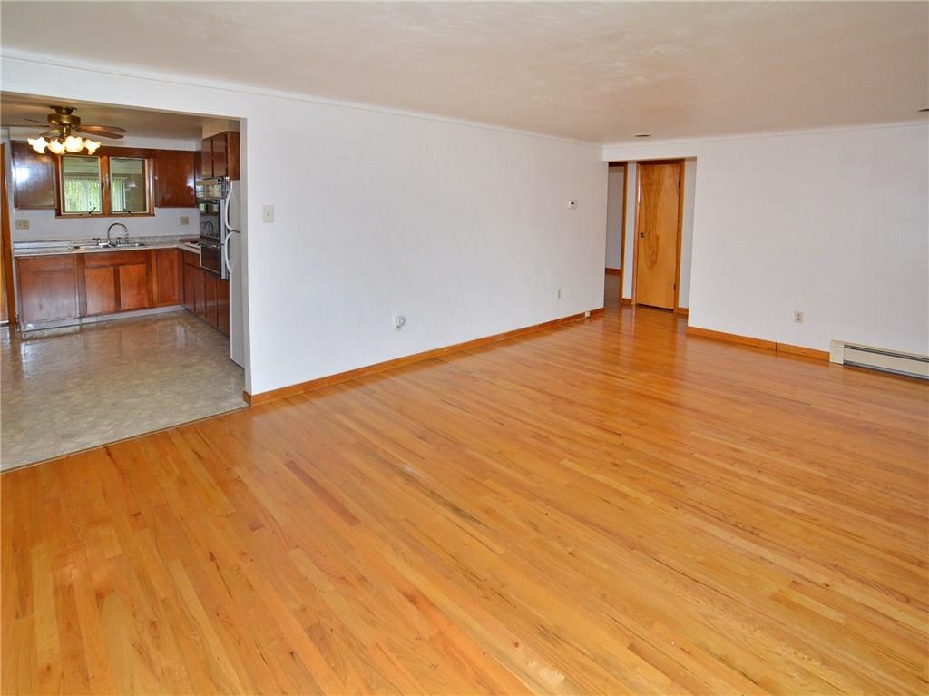 14111 Ridge Road North Huntingdon, PA 15642 - Photo 8 of 24 Other side of living room into hallway and bedrooms