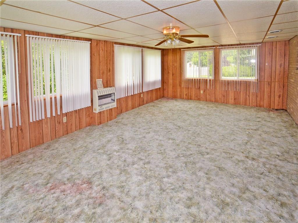 14111 Ridge Road North Huntingdon, PA 15642 - Photo 9 of 24 4 Season Family room off kitchen - separate heat source but central air - LOTS OF WINDOWS - LOTS OF LIGHT