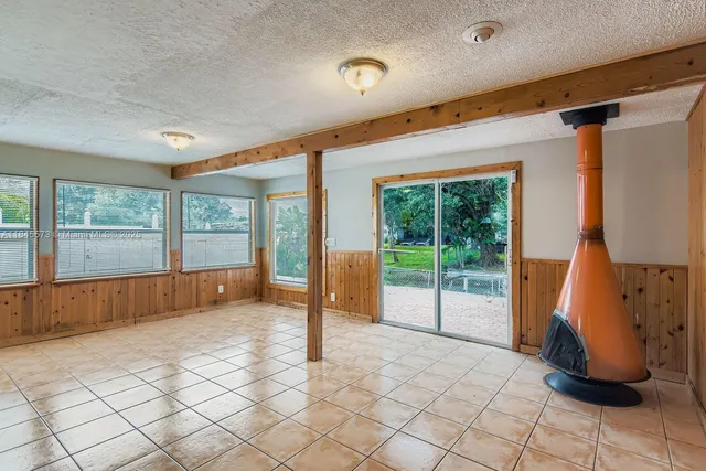 a view of an empty room and window