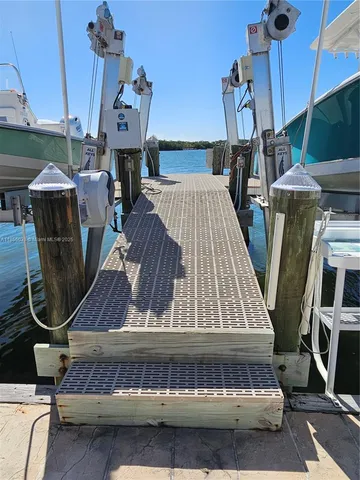 a view of a balcony with furniture
