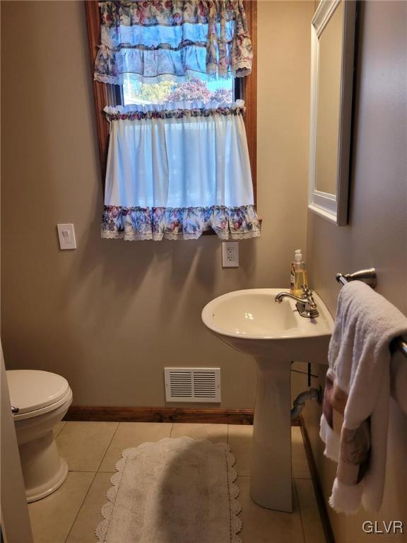 227 Ridgewood Road Easton, PA 18045 - Photo 21 of 49 a bathroom with a sink a toilet and a mirror