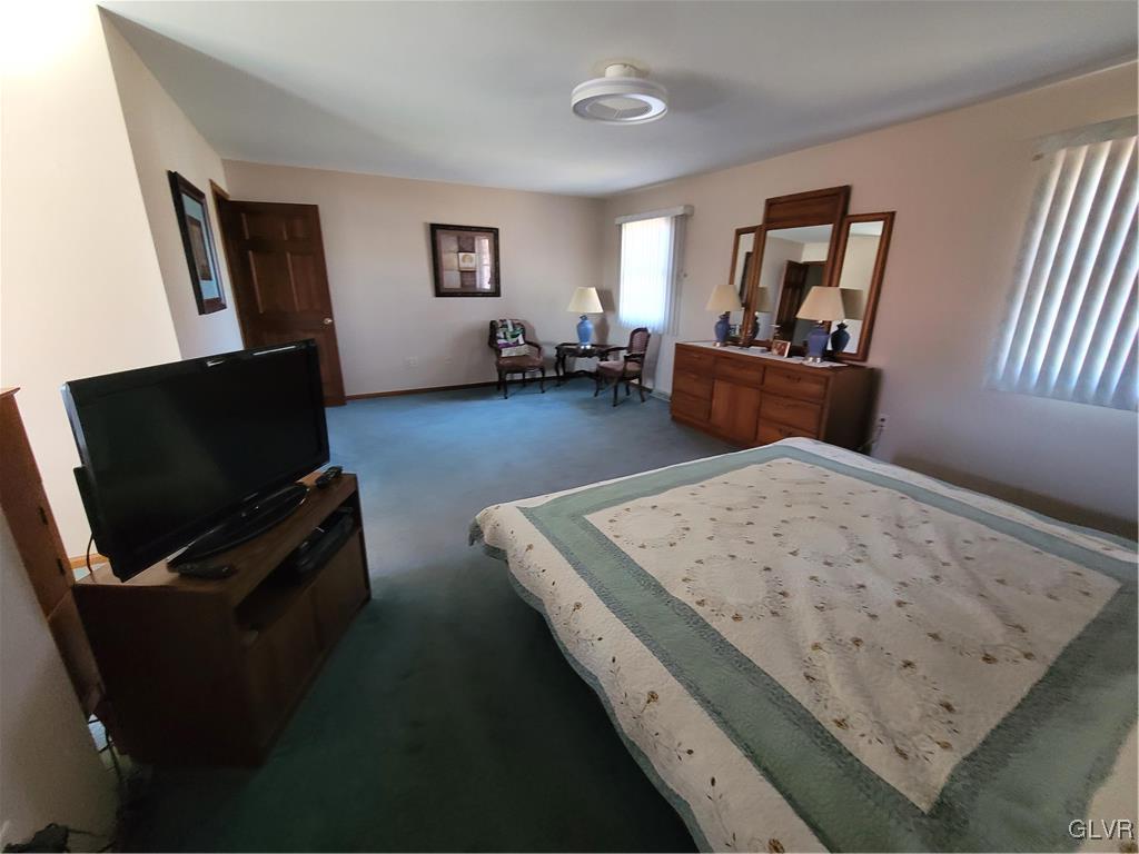 227 Ridgewood Road Easton, PA 18045 - Photo 26 of 49 a living room with furniture and a flat screen tv