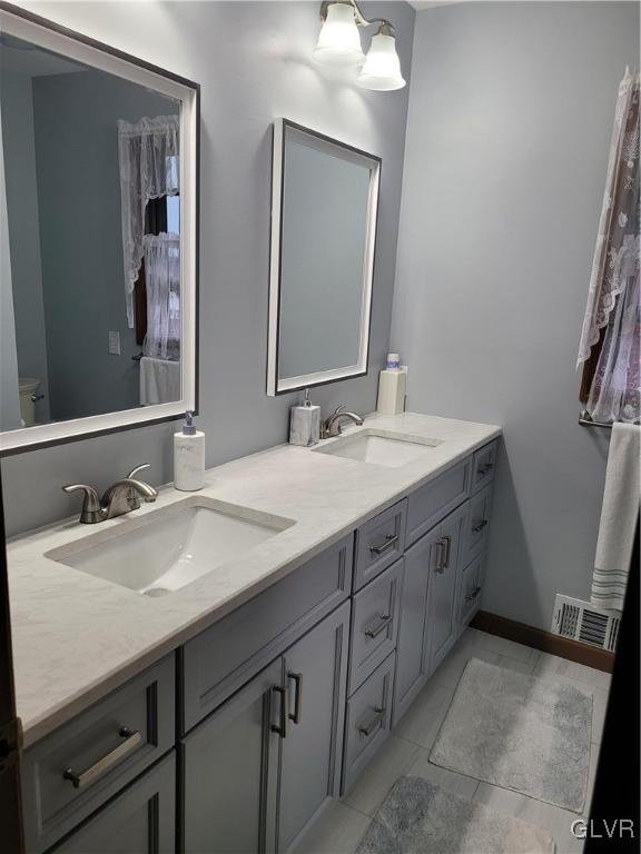 227 Ridgewood Road Easton, PA 18045 - Photo 28 of 49 a bathroom with double sink and two mirror
