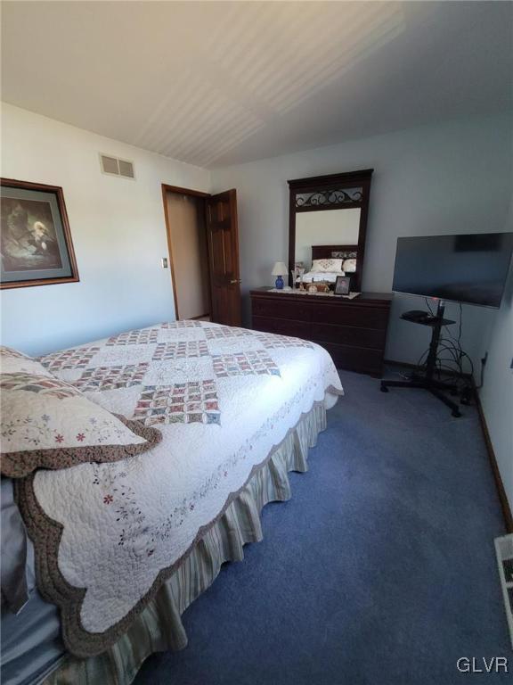 227 Ridgewood Road Easton, PA 18045 - Photo 36 of 49 a bedroom with bed and a view of kitchen