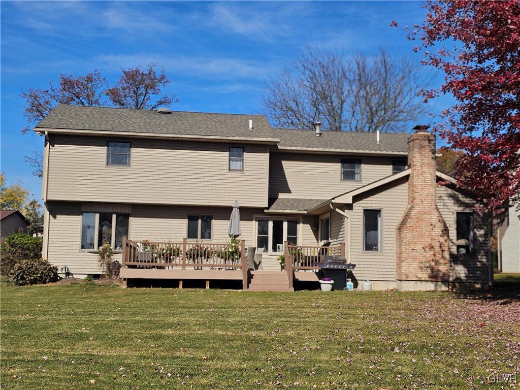 227 Ridgewood Road Easton, PA 18045 - Photo 46 of 49 a view of a ocean with lawn chairs and a fireplace