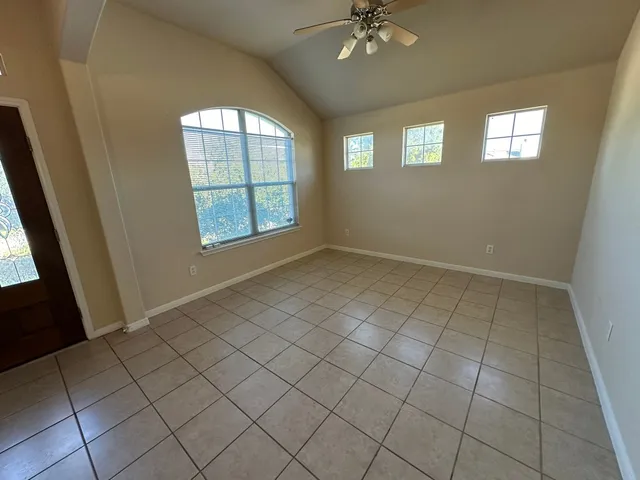 an empty room with windows