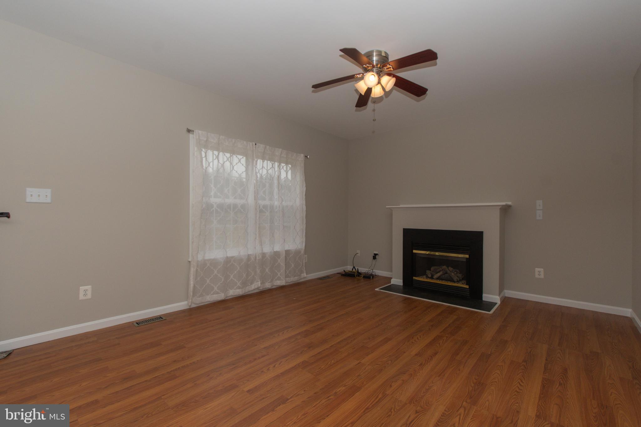 495 Harrington Road Rising Sun, MD 21911 - Photo 22 of 64 Family room off kitchen w/laminate floor