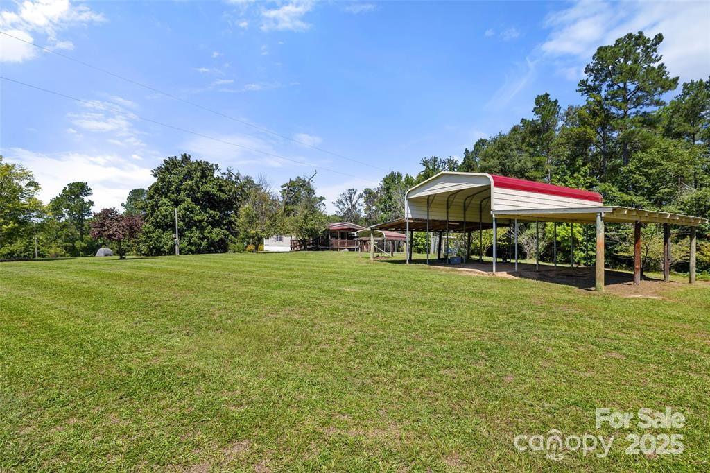 3478 Cool Branch Road Carlisle, SC 29031 - Photo 23 of 23 a view of a house with a yard