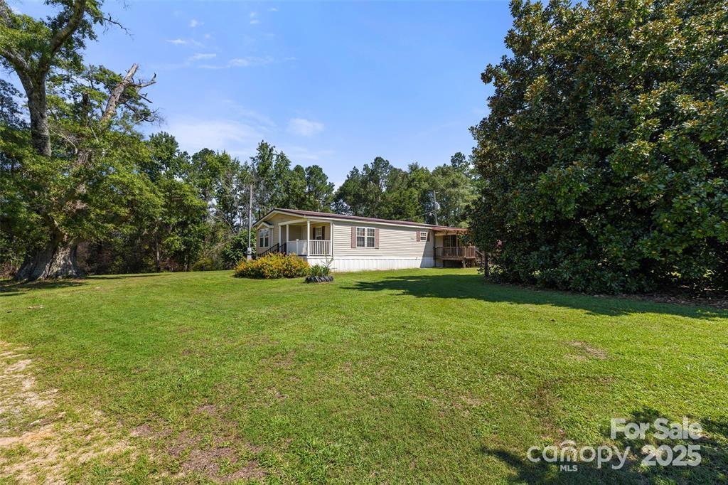 3478 Cool Branch Road Carlisle, SC 29031 - Photo 4 of 23 a house view with a garden space